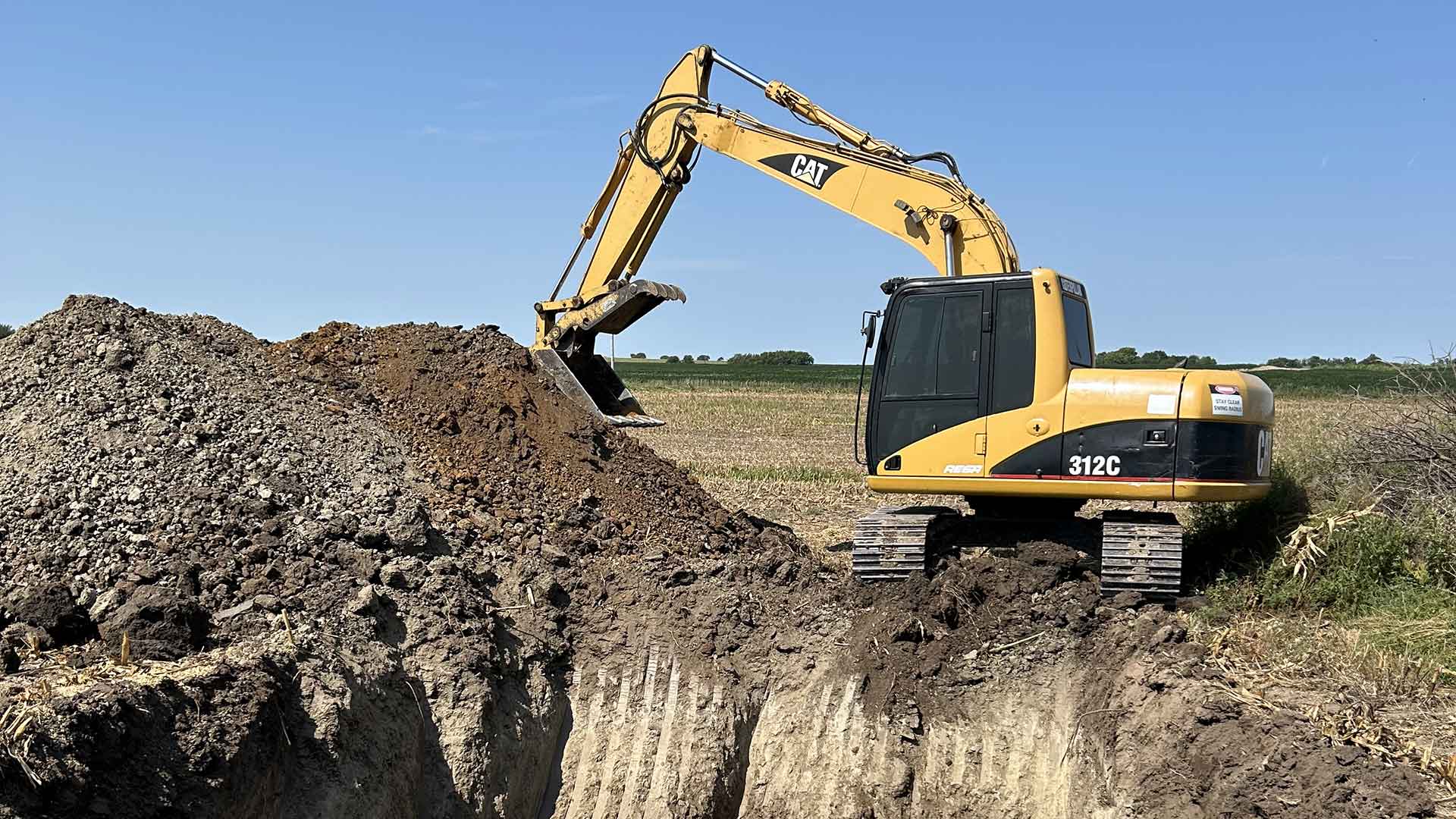 An example of a project completed by PB Land management, providing skid loader, excavation, septic, driveway, culvert, pond, tree clearing, dam, digging, road, lagoon, grade work, hauling, demolition, farmstead cleaning, retaining wall, snow removal, and brush hogging services to north central Kansas.
