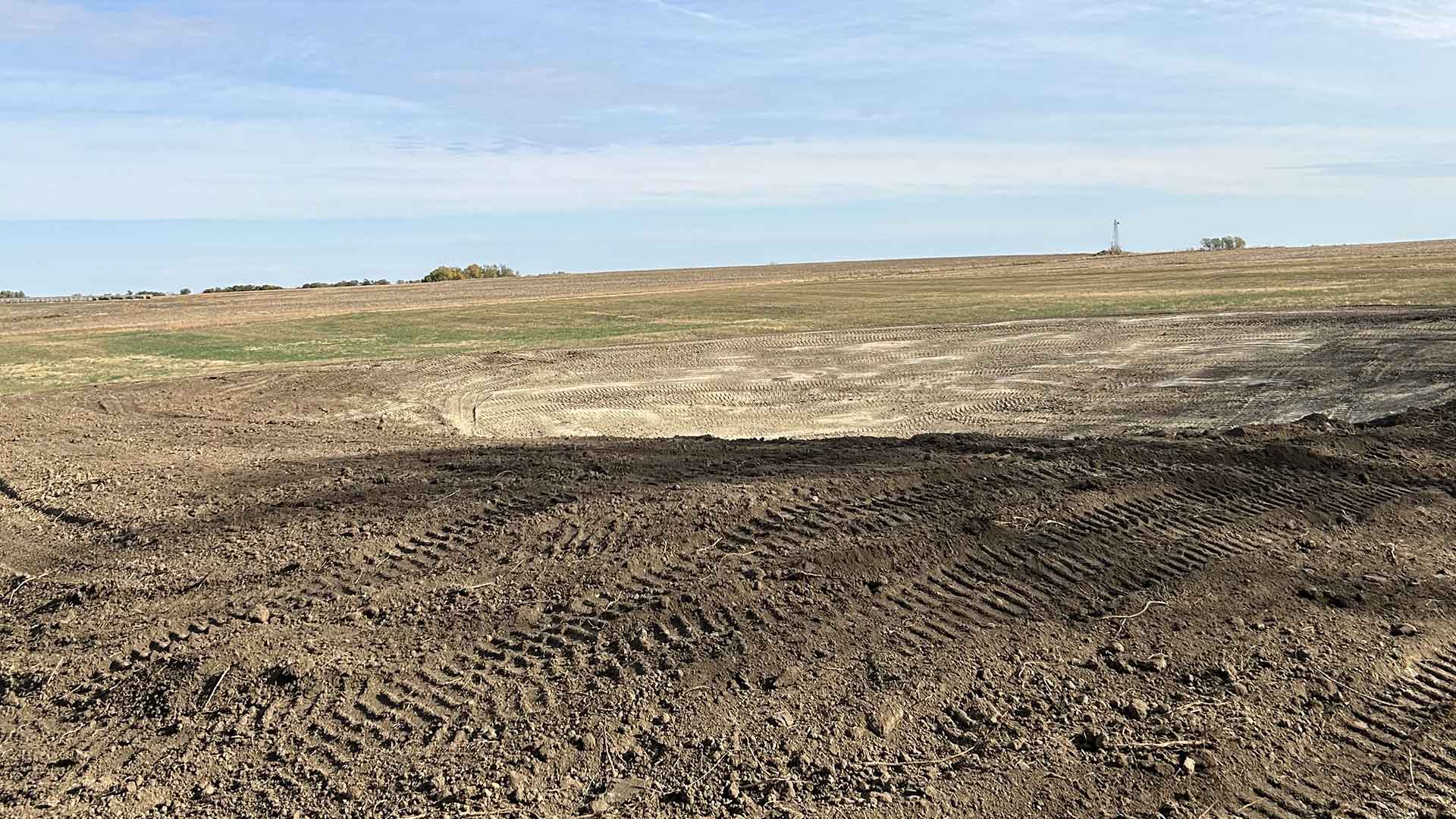 An example of a project completed by PB Land management, providing skid loader, excavation, septic, driveway, culvert, pond, tree clearing, dam, digging, road, lagoon, grade work, hauling, demolition, farmstead cleaning, retaining wall, snow removal, and brush hogging services to north central Kansas.