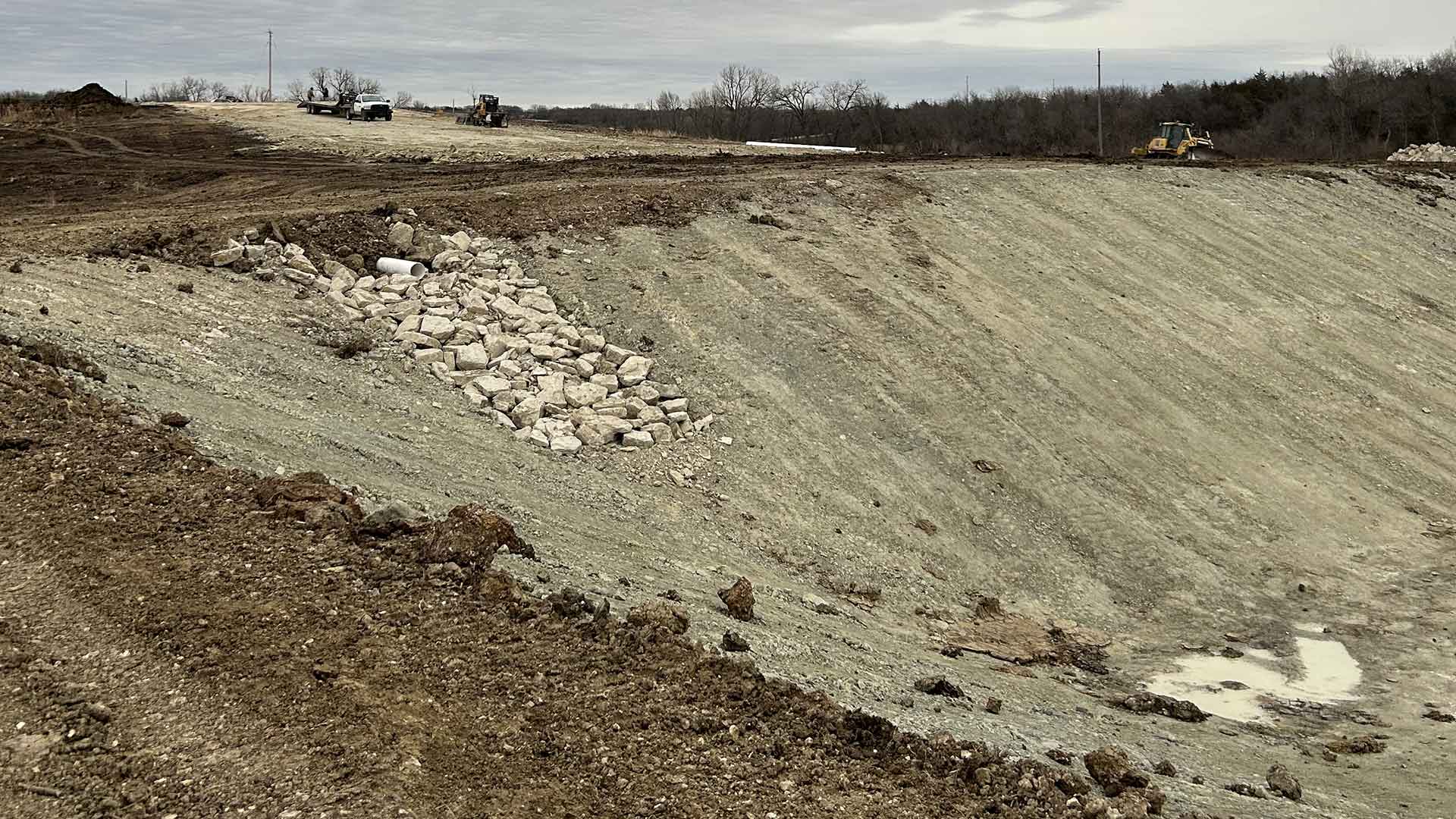 An example of a project completed by PB Land management, providing skid loader, excavation, septic, driveway, culvert, pond, tree clearing, dam, digging, road, lagoon, grade work, hauling, demolition, farmstead cleaning, retaining wall, snow removal, and brush hogging services to north central Kansas.